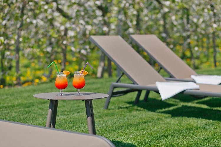 Comfortable sun loungers in the garden